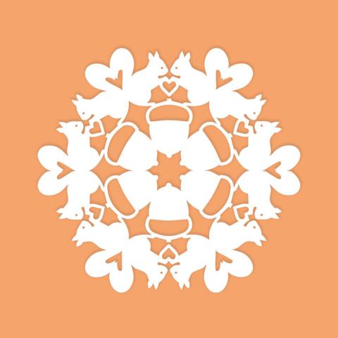 paper snowflake with squirrel pattern