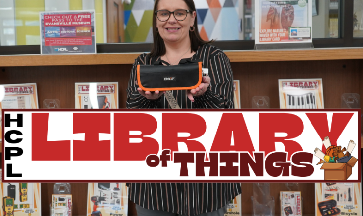 Woman holding up an item from the Library of Things collection